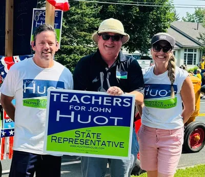 Parade participants celebrating in the community